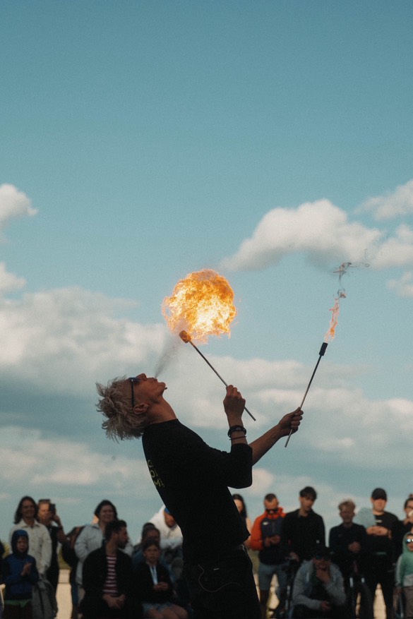 Lypski performing fire breathing